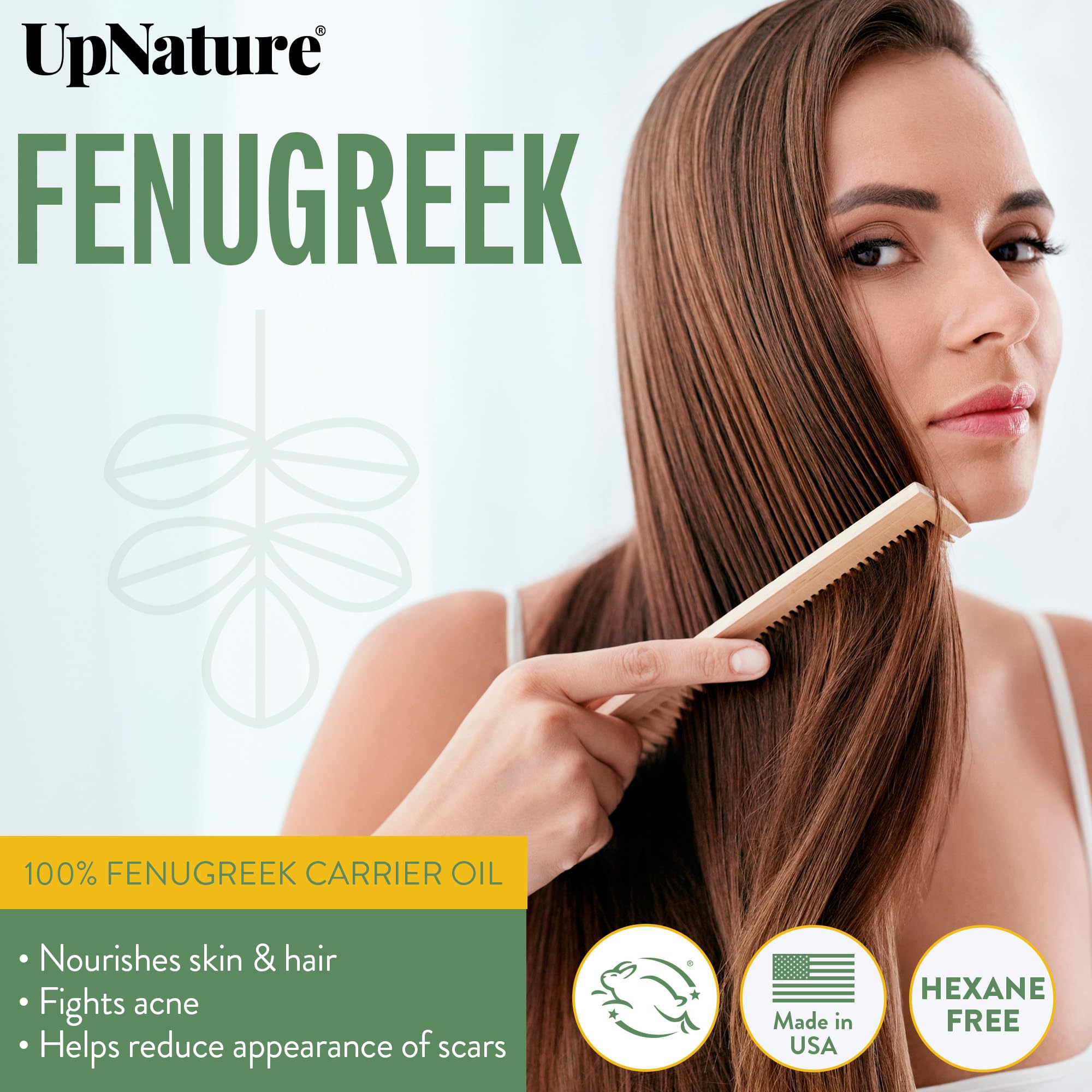 Close-up of UpNature Fenugreek Oil dropper highlighting undiluted quality.