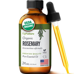 UpNature Rosemary Oil bottle pouring, highlighting purity for hair care