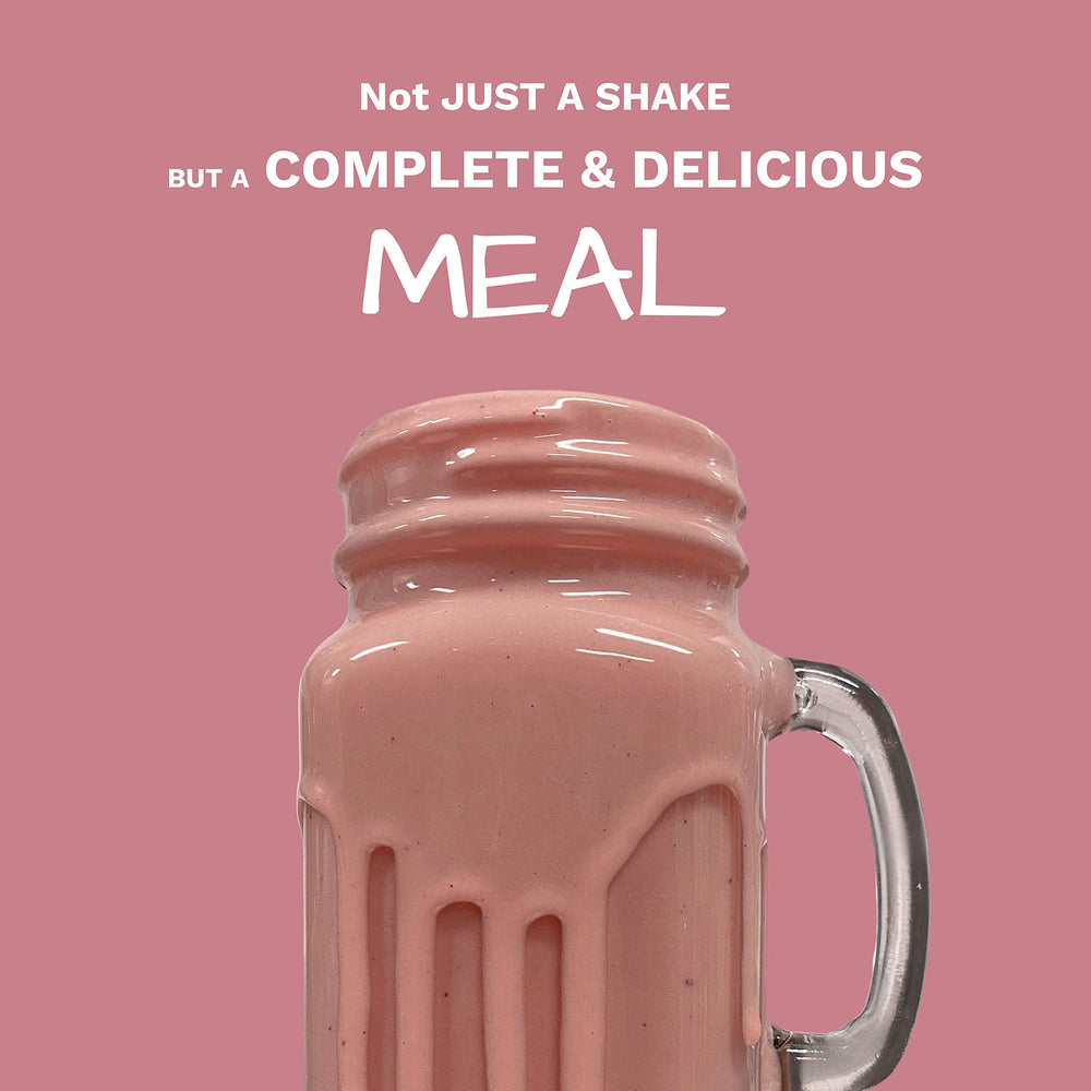 UpNourish Strawberry Banana Shake Pour demonstrates a creamy smoothie with plant protein