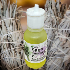 Urban ReLeaf Sage Smudging Oil in hand showing silky moisturizer and massage use.