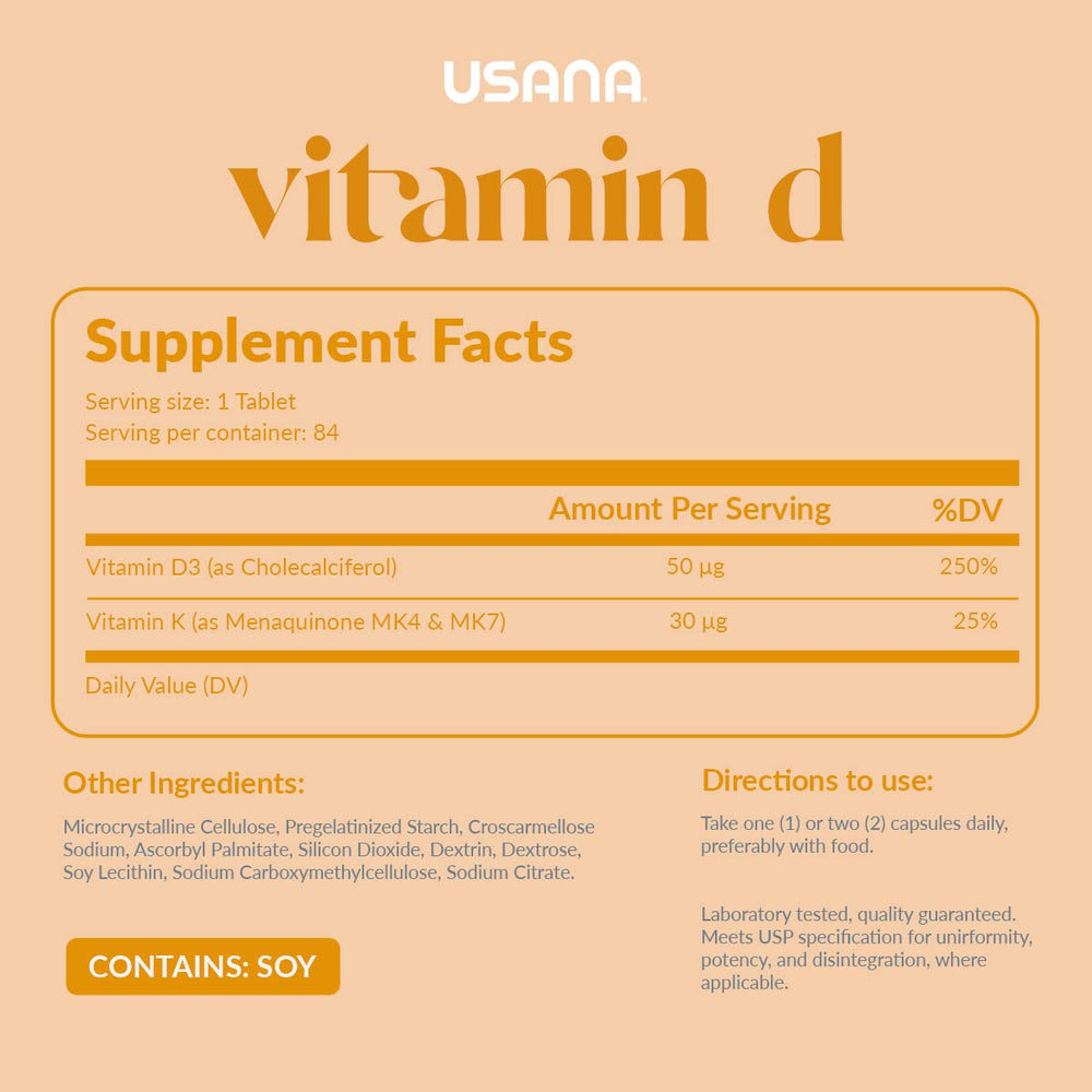 Close-up of USANA Vitamin D tablets showing texture and dosage.