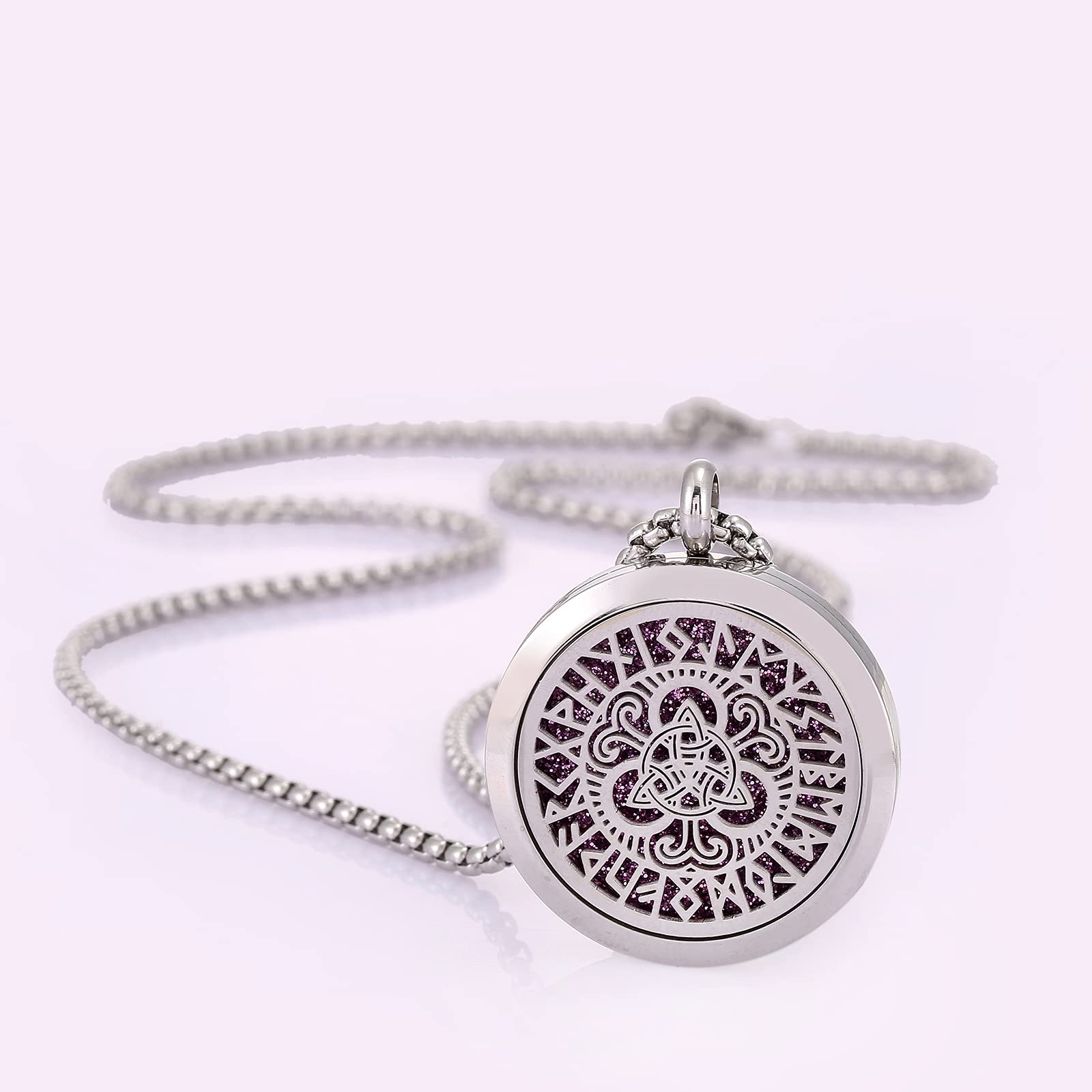 UTHOSMDO stainless steel locket closeup, showing durable 316L construction and secure magnetic closure to help prevent oil stains.