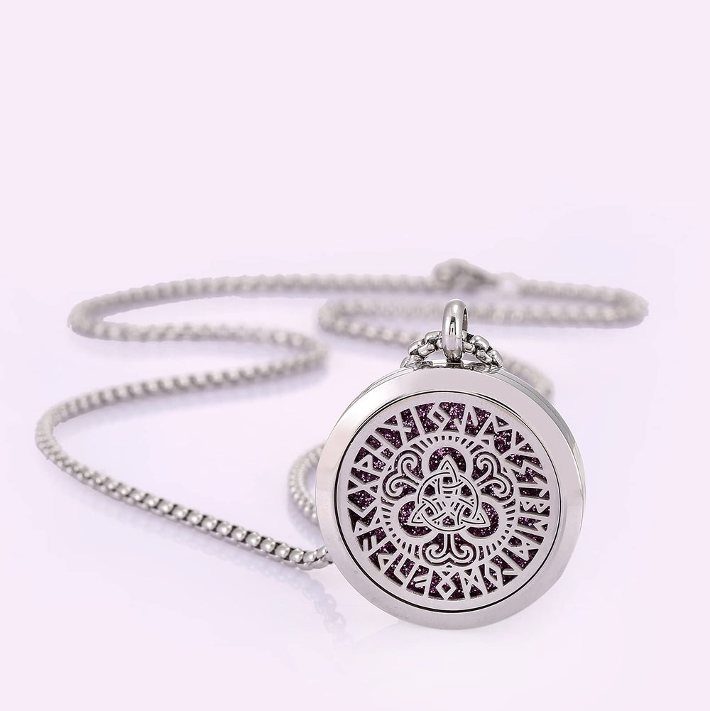 UTHOSMDO stainless steel locket closeup, showing durable 316L construction and secure magnetic closure to help prevent oil stains.