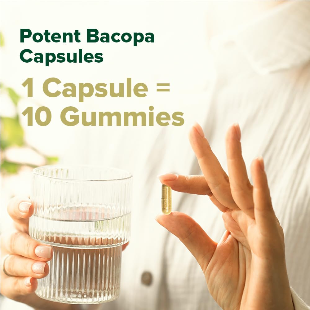 VAHDAM capsules in hand for on-the-go focus support.