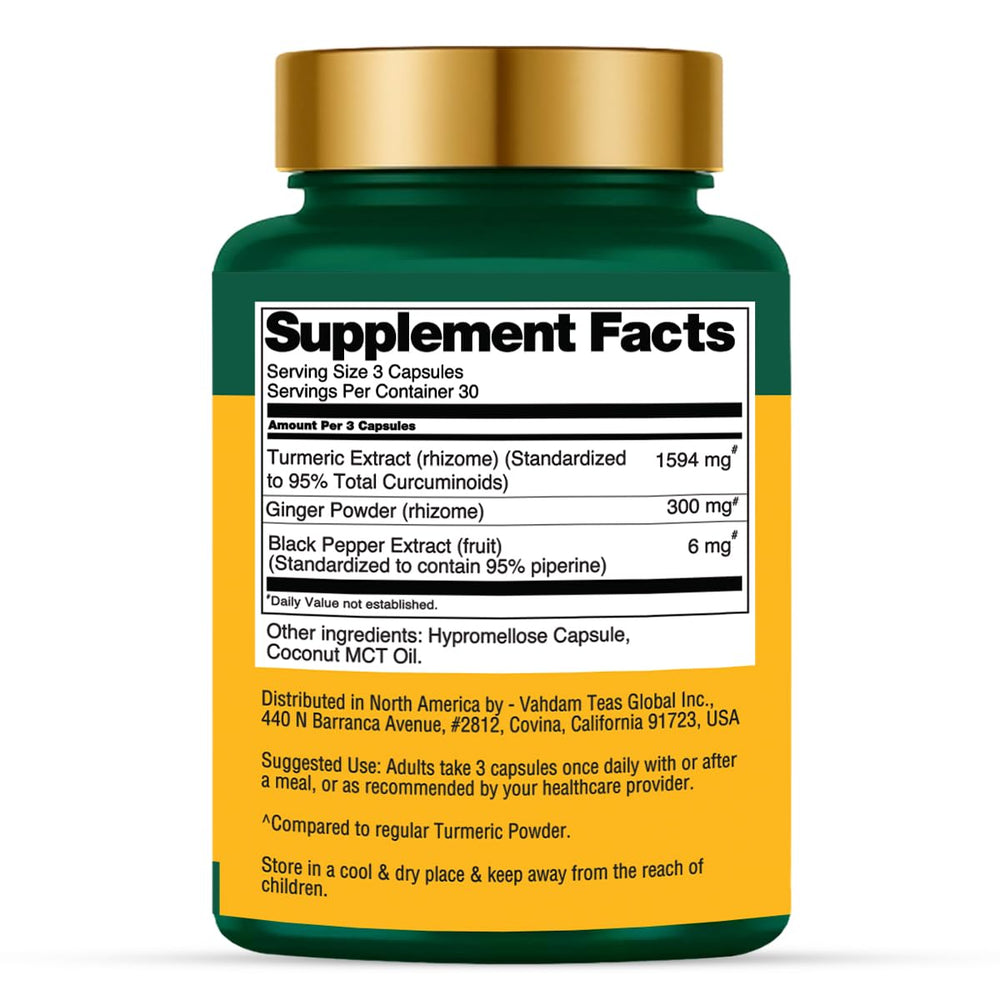 VAHDAM Turmeric Ginger bottle side label shows non-GMO and gluten-free quality