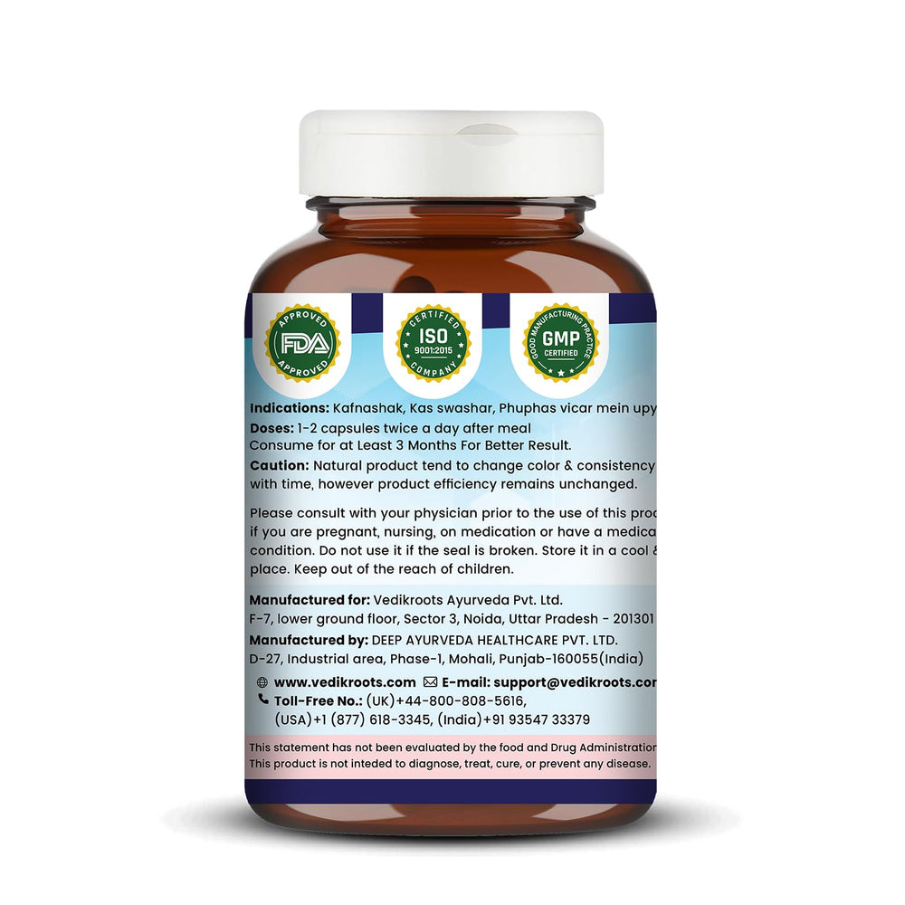 VEDIKROOTS NicoShield capsules close-up showing herbal blend for wellness.