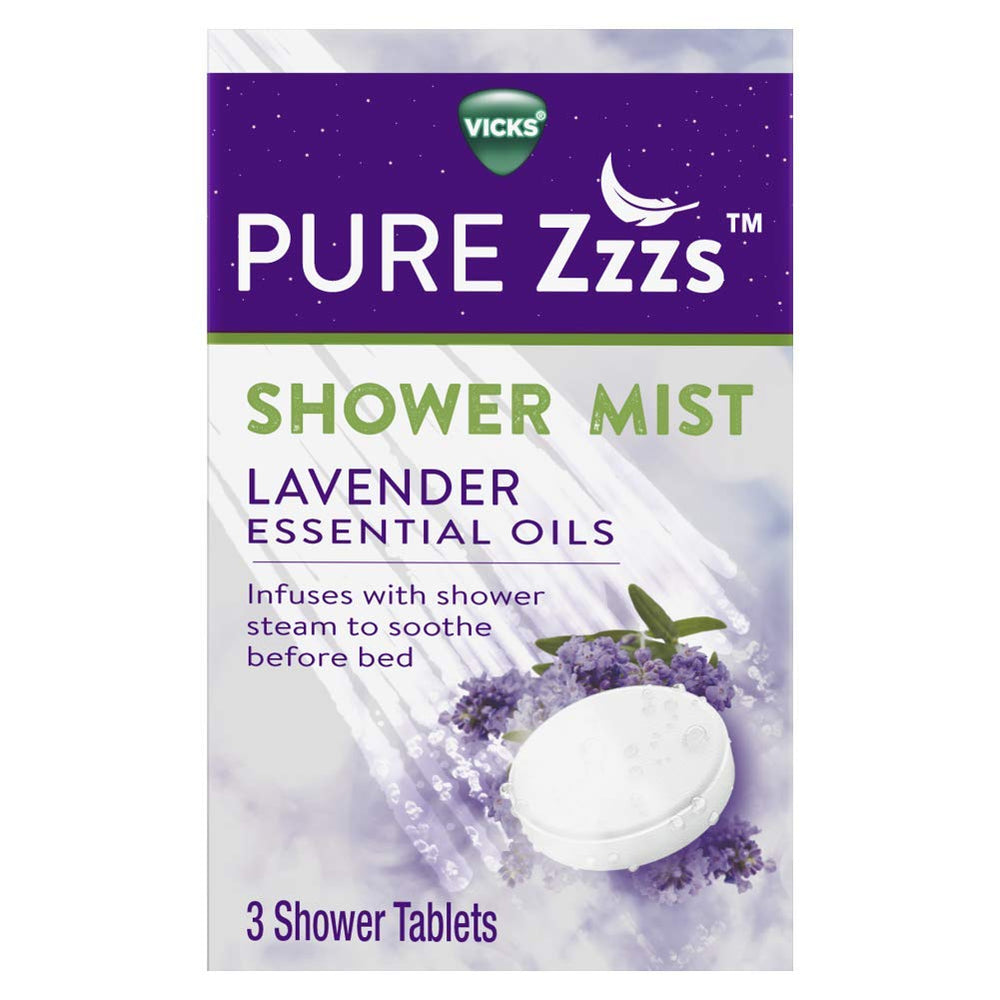 Vicks Pure Zzzs lavender-shower-tablets releasing calming steam in the shower