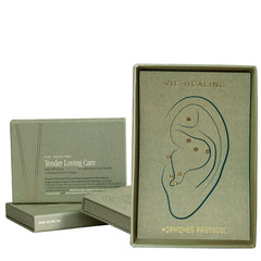 Vie Healing 24K ear seeds closeup for premium auriculotherapy in a luxury self-care routine