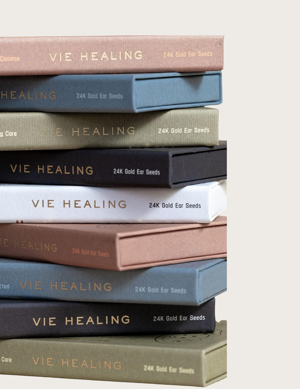Vie Healing 24k gold ear seeds prepared on clean skin for best results.