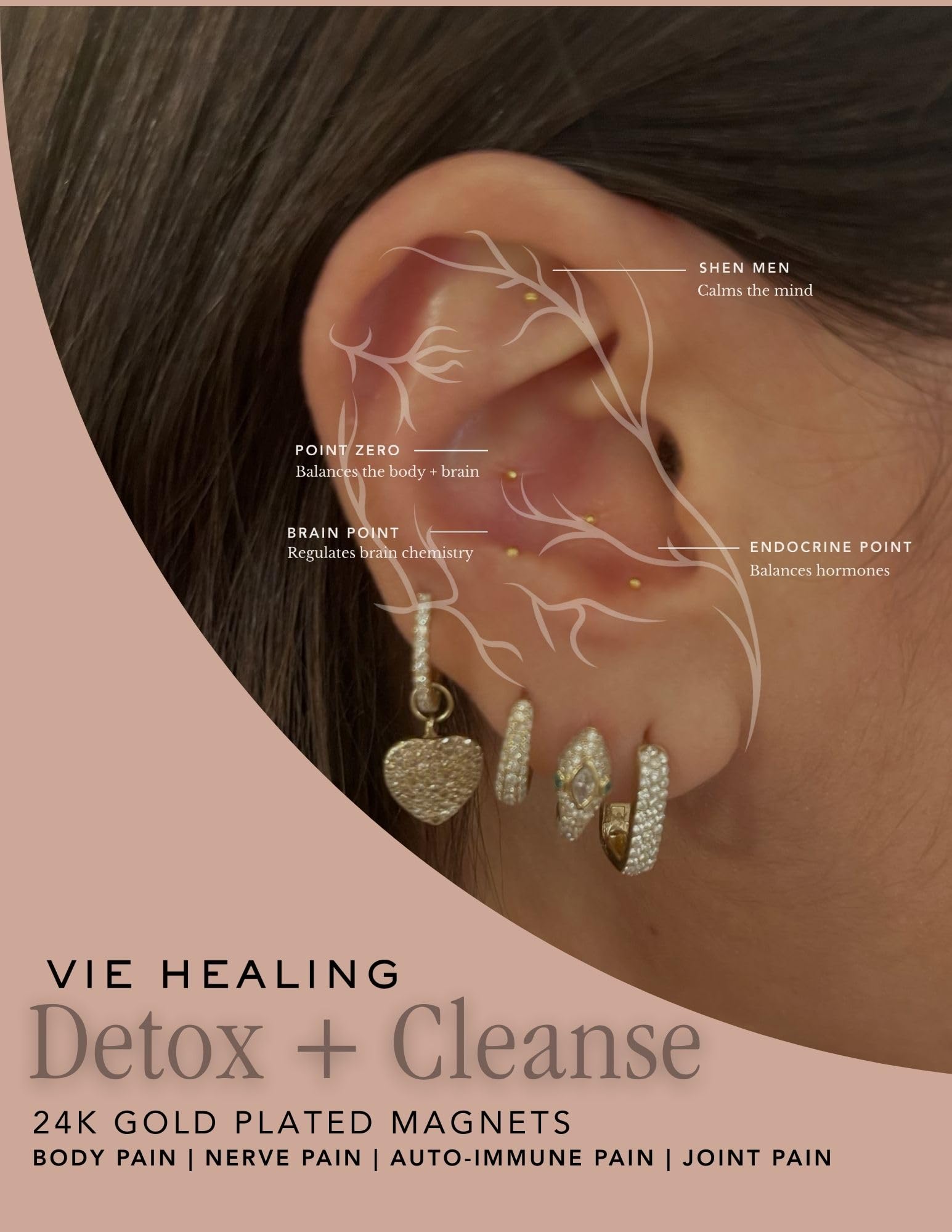 Vie Healing 24k gold ear seeds applied to ear for non-invasive comfort.