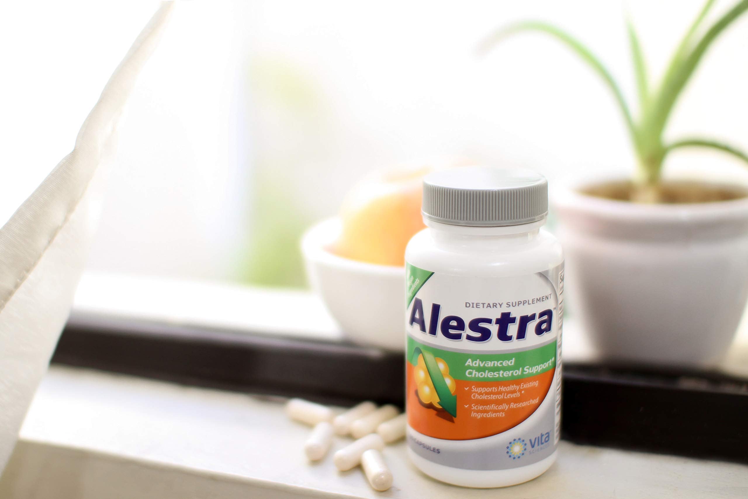 Vita Sciences Alestra capsules close-up emphasizing vegetarian capsule form.