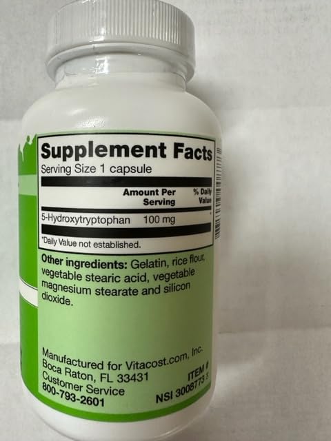 Vitacost 5-HTP capsules closeup, small soft gel capsules for daily well-being possibilities.
