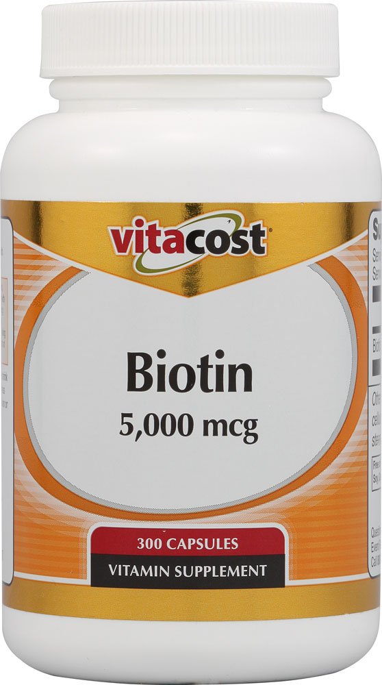 Vitacost Biotin bottle and capsules supporting healthy hair, skin, and nails.