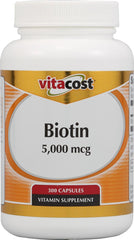 Vitacost Biotin bottle and capsules supporting healthy hair, skin, and nails.