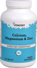Vitacost Calcium, Magnesium & Zinc bottle pour showing daily mineral support