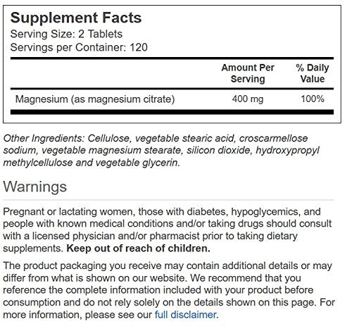 Close-up of Vitacost Magnesium Citrate tablets; supports nerve function and protein production.