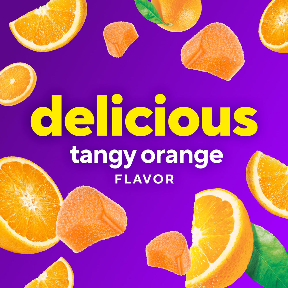 Gummies poured into a glass, showcasing convenient daily vitamin C.