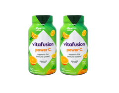 Vitafusion Power C orange bottle pour demonstrates easy daily immune support.