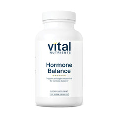 Vital Nutrients Hormone Balance bottle on wood table showing hormone metabolism support