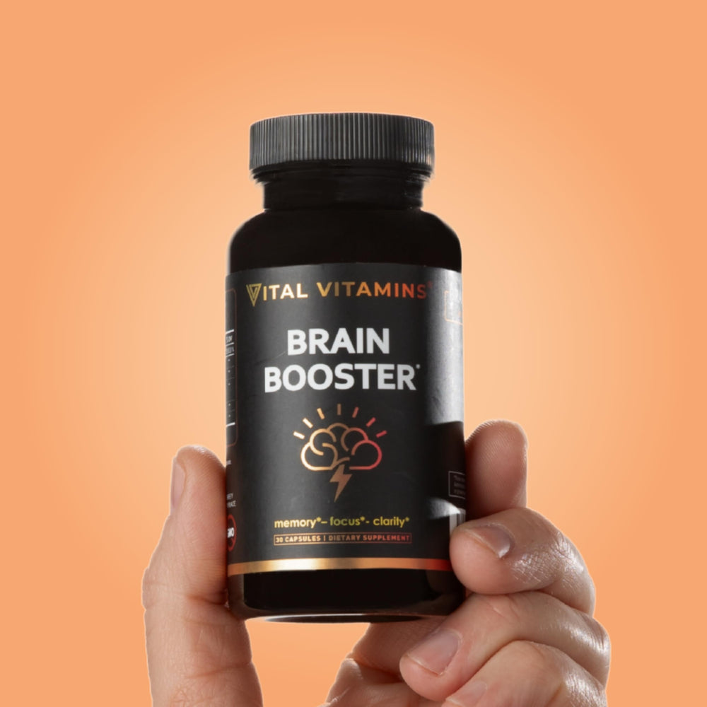 Vital Vitamins Brain Booster on a study desk for focused study sessions.