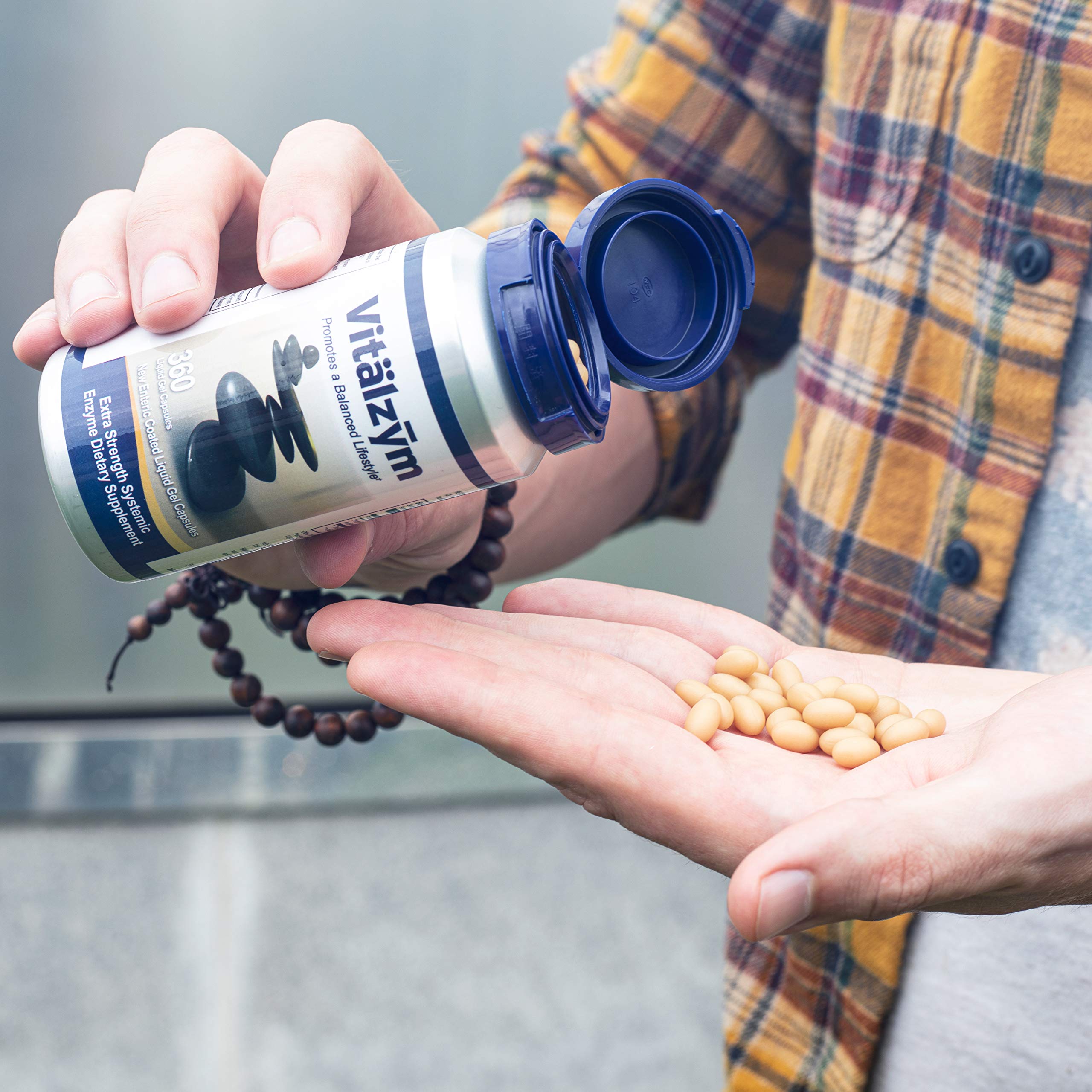 VITÄLZYM vegetarian formula highlighting absence of gluten, dairy, and yeast.