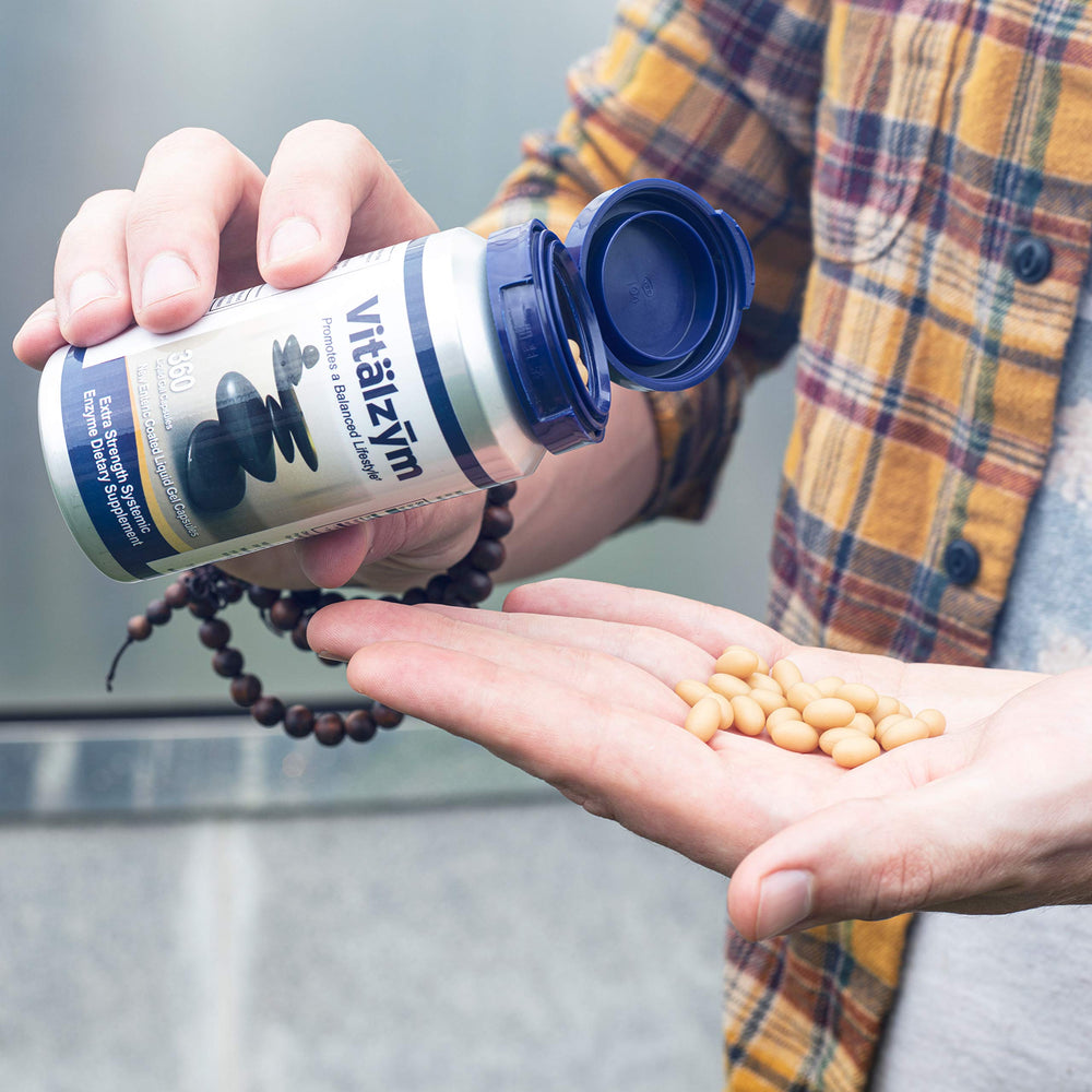 VITÄLZYM vegetarian formula highlighting absence of gluten, dairy, and yeast.