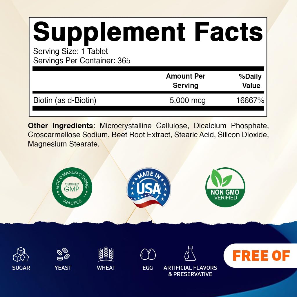 Close-up of Vitamatic Biotin 5000mcg tablets showing compact vegan tablets.