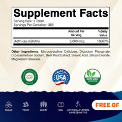Close-up of Vitamatic Biotin 5000mcg tablets showing compact vegan tablets.