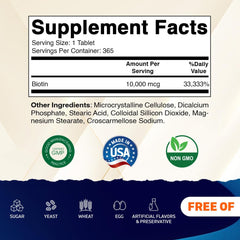 Vitamatic Biotin tablets being poured from bottle for daily beauty support.