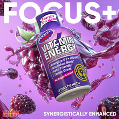 Vitamin Energy Focus+ Berry Shot on a desk with glass of water and laptop in background