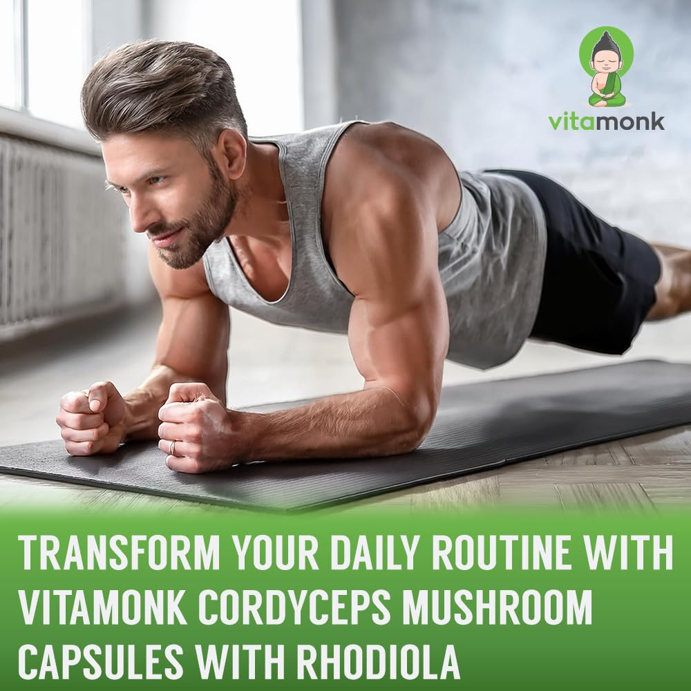 VitaMonk Cordyceps Rhodiola capsules held in hand for portability.