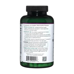 Capsules in hand with Vitanica Women's Symmetry for easy daily intake.