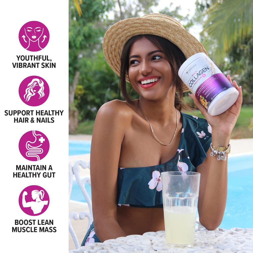 Vitauthority collagen drink in a glass with vibrant tropical color.
