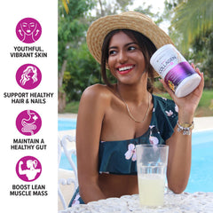 Vitauthority collagen drink in a glass with vibrant tropical color.