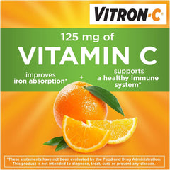 Vitron-C tablet beside label showing 65mg iron content.