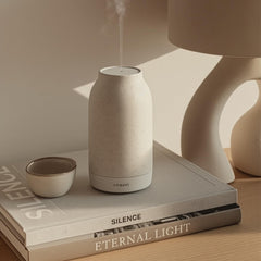 Vitruvi diffuser with premium matte ceramic finish blending with decor