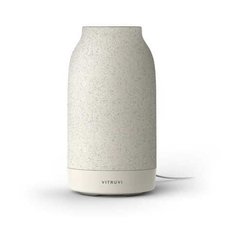 Vitruvi air waterless diffuser showing 1,500 sq ft coverage for large rooms and open spaces