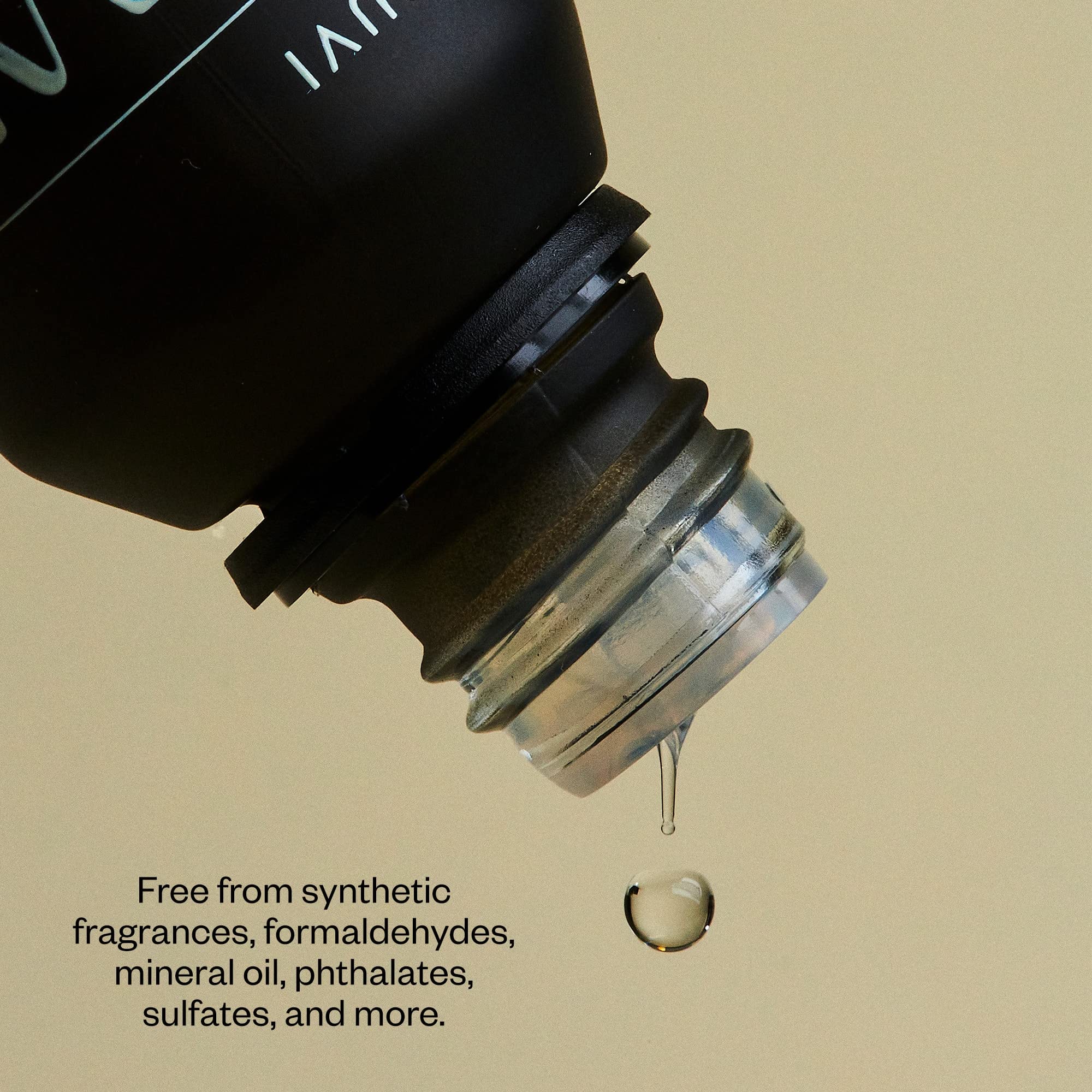 Vitruvi Breathe oil bottle and dropper ready to diffuse.