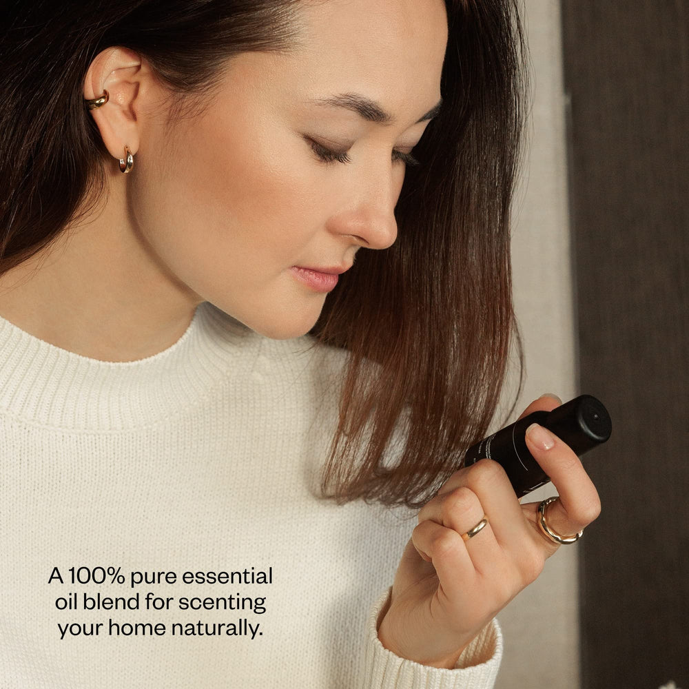 Vitruvi Grove bottle image shows compact, travel-friendly diffuser.