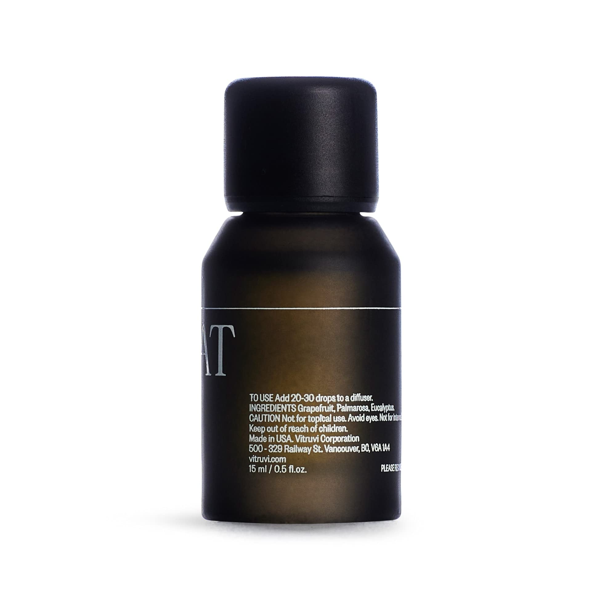 Vitruvi Retreat packaging and bottle on a clean vanity