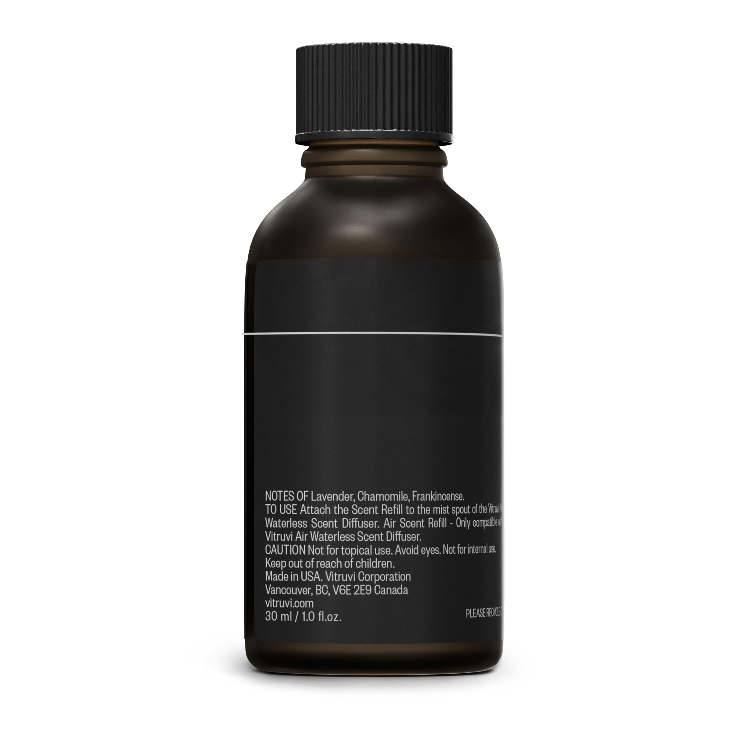 Vitruvi Sleep Scent Refill next to a diffuser for an evening wind-down routine.