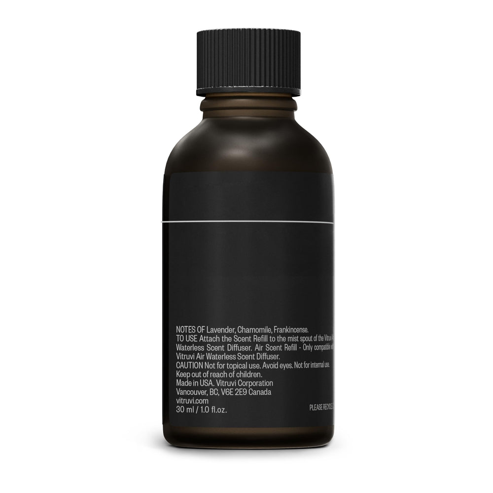 Vitruvi Sleep Scent Refill next to a diffuser for an evening wind-down routine.