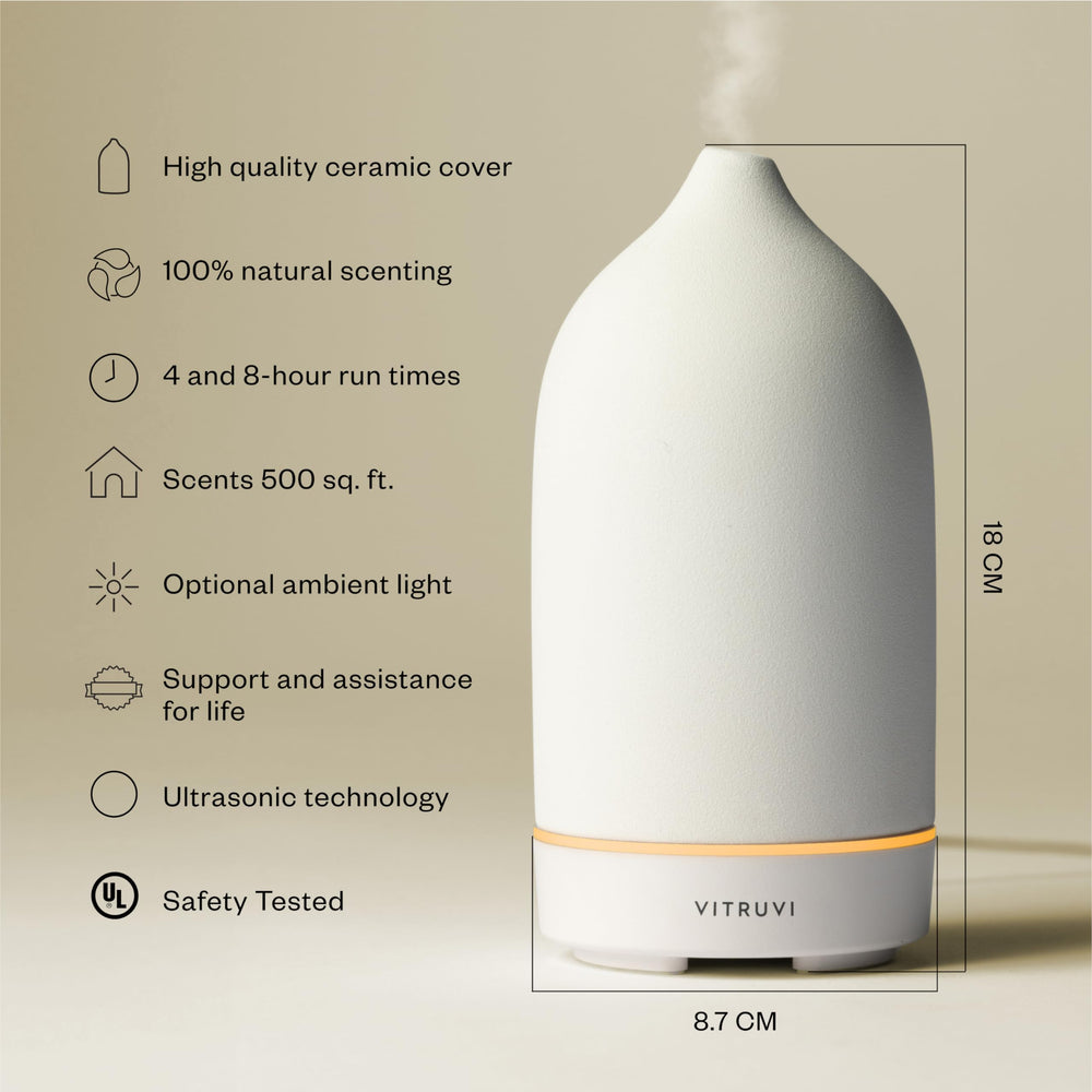 Vitruvi Stone Diffuser ambient LED glow enhances cozy desk ambience