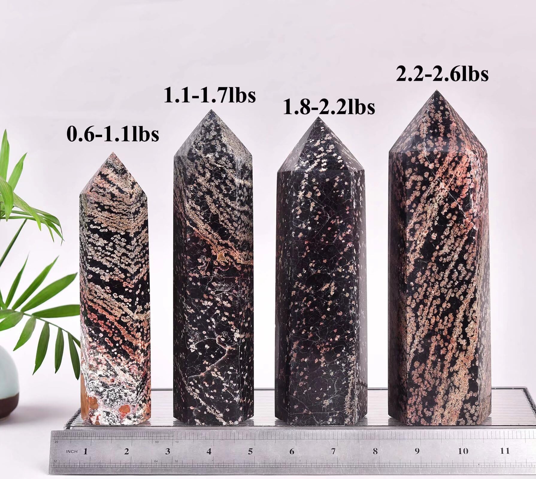 VIZYTOU Gold Snowflake Obsidian tower as a striking home decor piece.