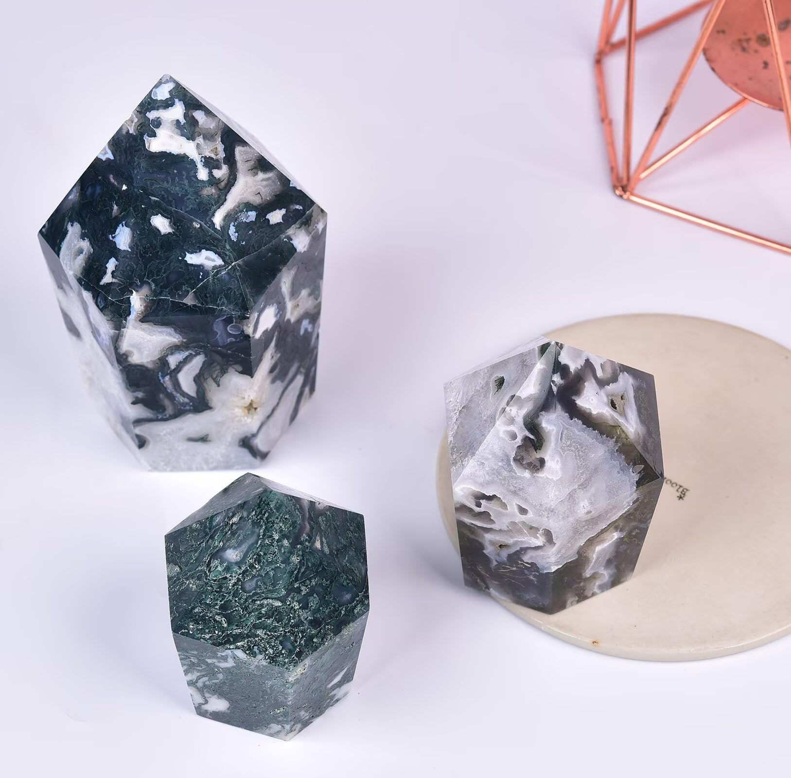 VIZYTOU moss agate tower weighs 1.1-1.7 lbs for grounding.