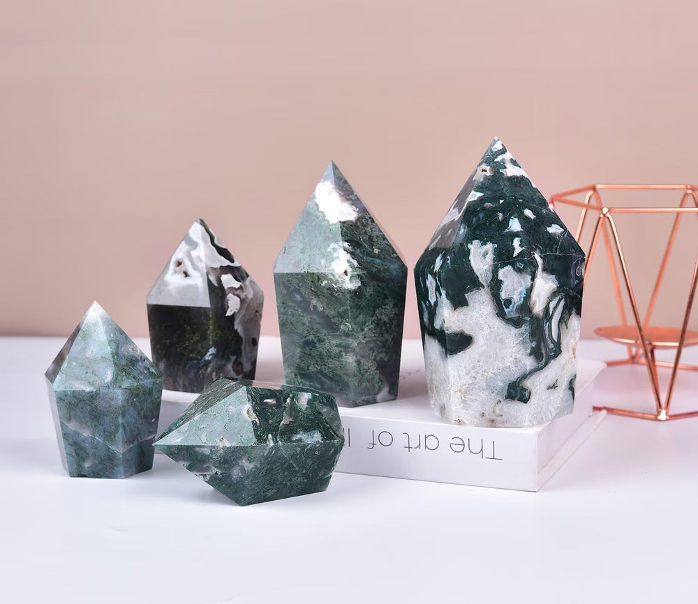 VIZYTOU moss agate obelisk supports mindful breathing during meditation sessions.