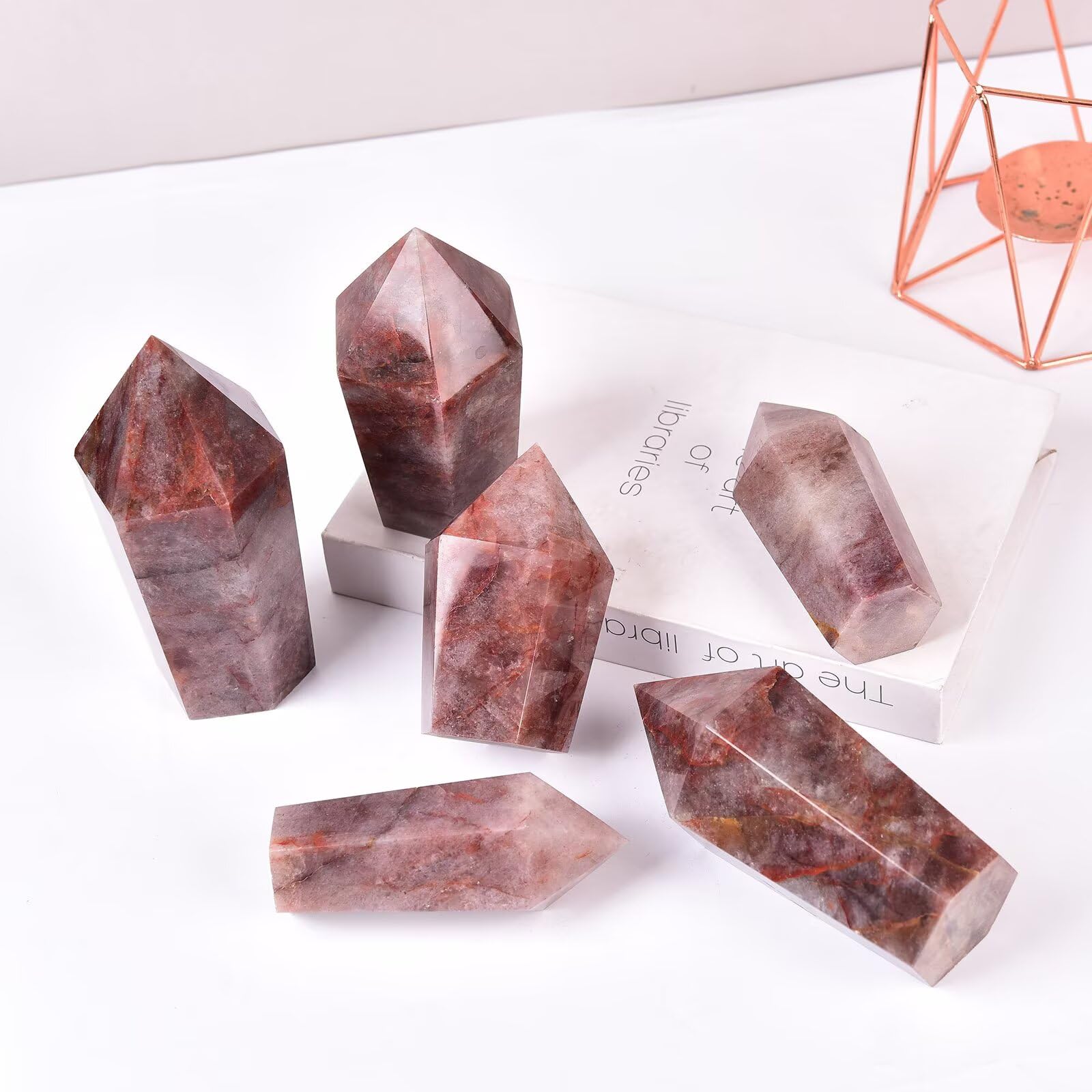 VIZYTOU red hematoid quartz obelisk on altar or desk, perfect for mindful setup.