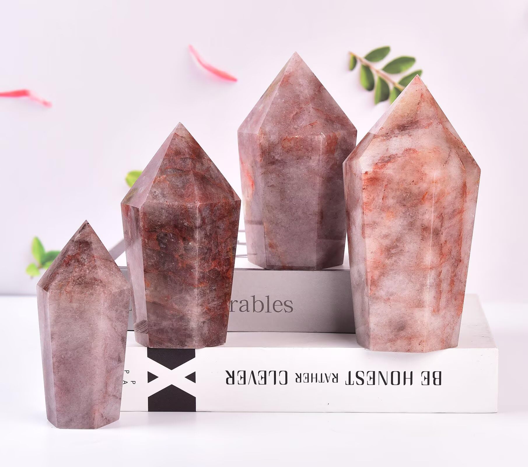 VIZYTOU red hematoid quartz obelisk with polished facets, adds subtle glow to rooms.