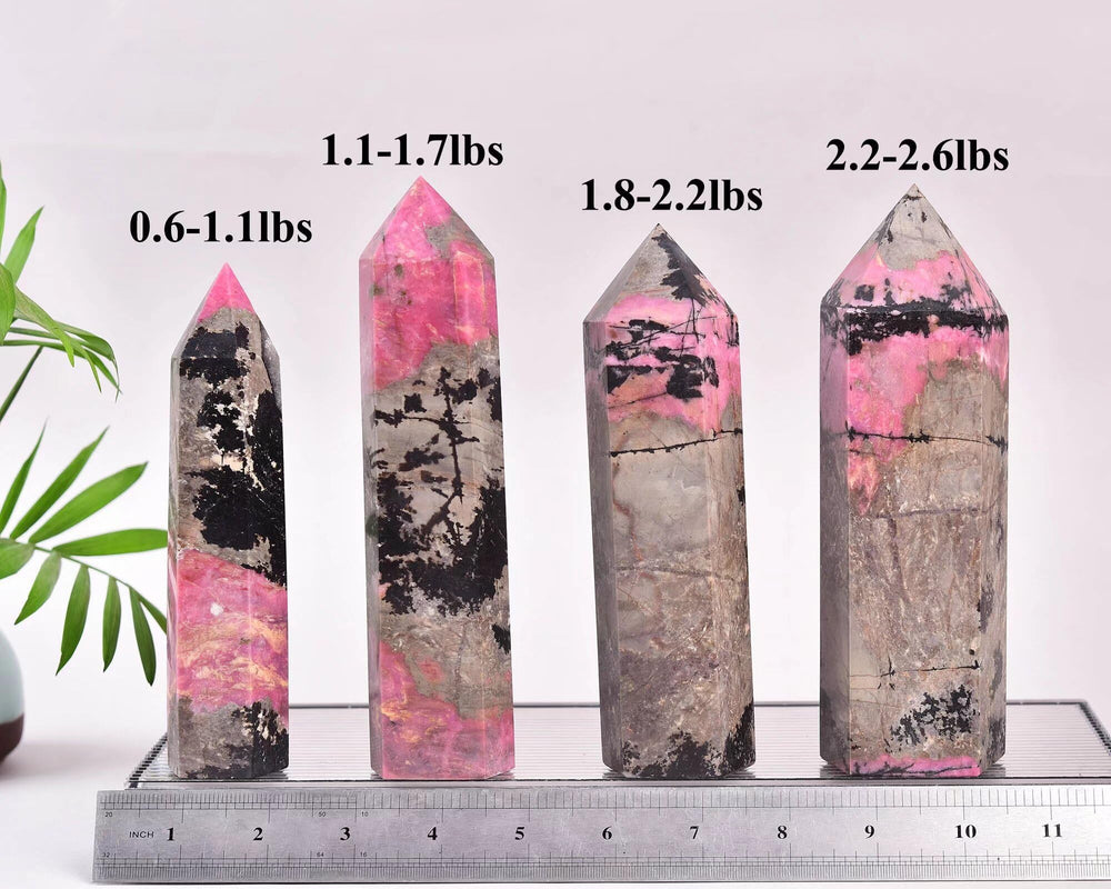 Hand-size reference of VIZYTOU Rhodonite tower obelisk for gifting ideas