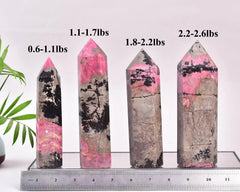 Hand-size reference of VIZYTOU Rhodonite tower obelisk for gifting ideas